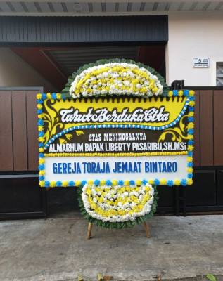 Papan Bunga Duka di Numfor Barat